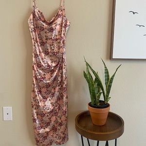 This is a satin Molly Green (size S) dress great for any occasion.